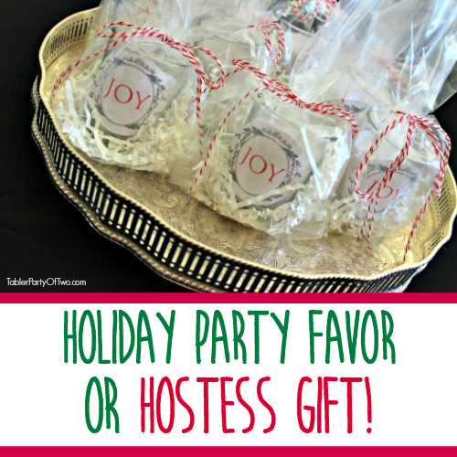 The perfect holiday DIY party favor or hostess gift with a FREE printable! All you need are votive candles, cellophane bags, crinkle paper and ribbon. So cute, festive and easy to make! TablerPartyofTwo.com